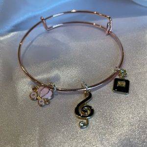 Charm bracelet w/ carriage, music note, & perfume charms, NWOT